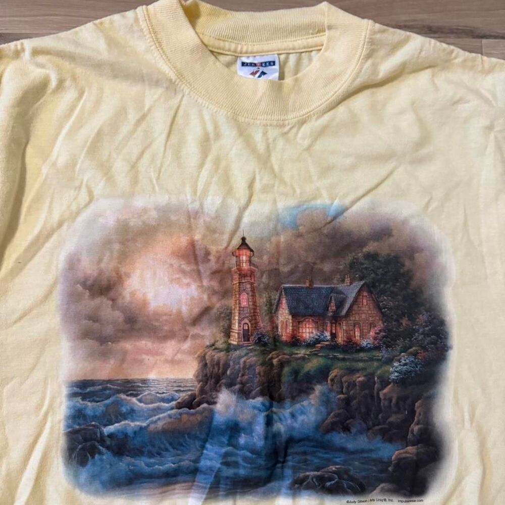 Vintage 90s yellow lighthouse graphic tee lighthouse on a rocky shore medium
